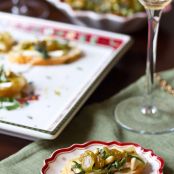 Brie Toasts with Basil, Pine Nuts and Golden Raisins