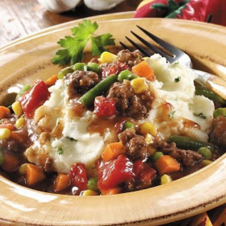 Ground Beef Stew over Cheesy Mashed Potatoes