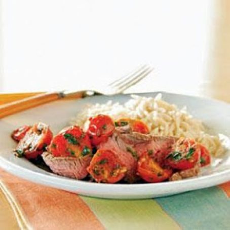 Grilled Flank Steak with Warm Tomato Topping