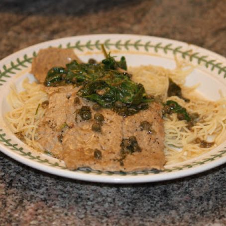 Veal Picata with strawberries, blueberrries and mandarin oranges
