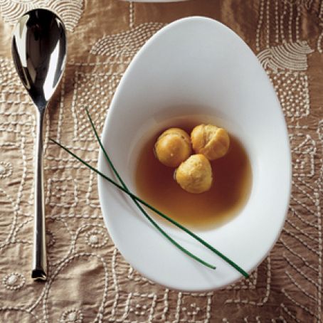 fontina filled pastry puffs in brodo