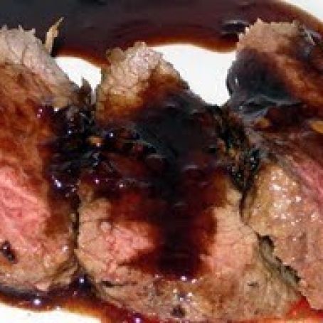 Fiery Pomegranate Sauce with grilled steak