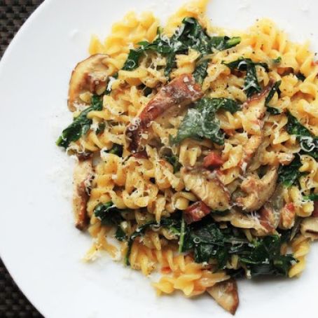Pasta in Skillet with Mushrooms, Pancetta, and Wilted Greens
