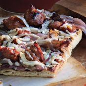Grilled Flatbreads with Caramelized Onions, Sausage, and Manchego Cheese
