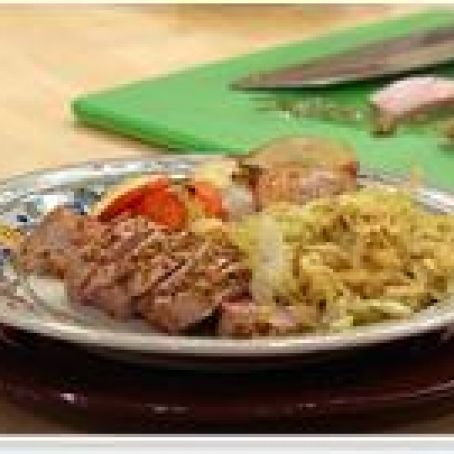 Roast Pork Tenderloins with Roasted Carrot, Parsnip, Potato and Warm Apple and Savoy Cabbage Slaw
