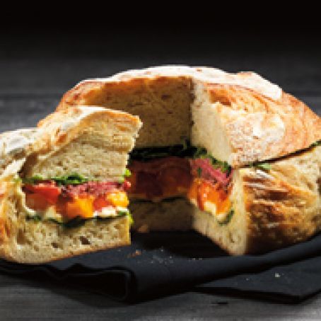 Stuffed Sourdough with Roast Beef, Taleggio, Marinated Tomatoes & Arugula