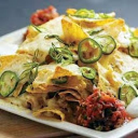 Cheesy Nachos with Guacamole and Salsa