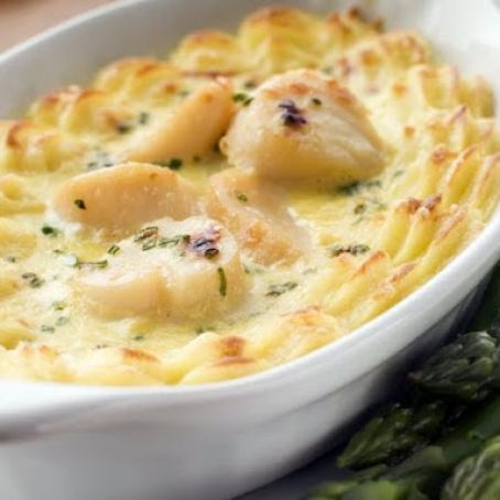 COQUILLES ST.JACQUES CON SALSA MORNAY