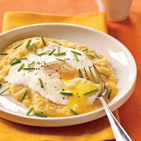 Eggs Blindfolded over Garlic Cheddar Grits