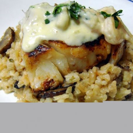 MERO EN CREMA DE COCO CON ARROZ SALTADO