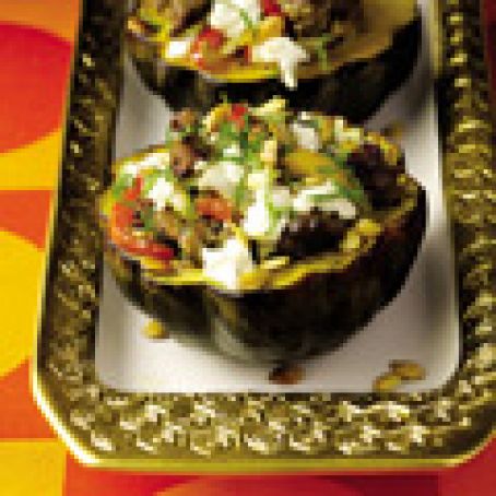 Guy Fieri's Roasted Acorn Squash with Turkey Sausage, Peppers, and Goat Cheese