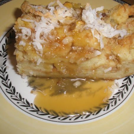 Pina colada white bread pudding with coconut topping/rum caramel sauce