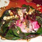 Stuffed SeaBass Wrapped in Chard with Pomegranate-Hazelnut Vinaigrette