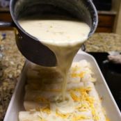 Chicken & Cheese Enchiladas with Green Chili & Sour Cream Sauce