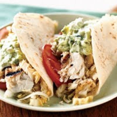 Fish Tacos with Creamy Lime Guacamole and Cabbage Slaw