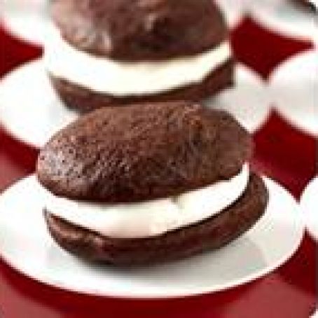 WHITE CHOCOLATE TRUFFLE AND CHOCOLATE FUDGE LAYER CAKE