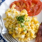 Scrambled Eggs with Corn, Goat Cheese and Roasted Tomatoes