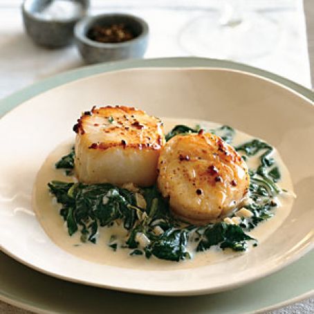 Seared Scallops on Spinach with Apple Brandy Cream Sauce