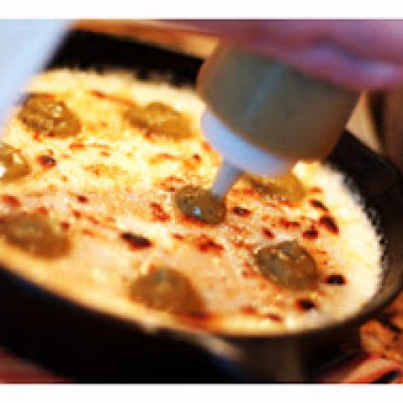 Queso fundido with roasted poblano vinaigrette