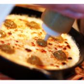 Queso fundido with roasted poblano vinaigrette