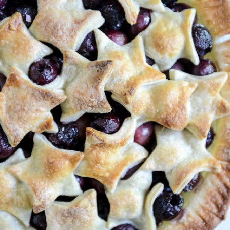 Sweet Cherry Pie with Amaretto Whipped Cream