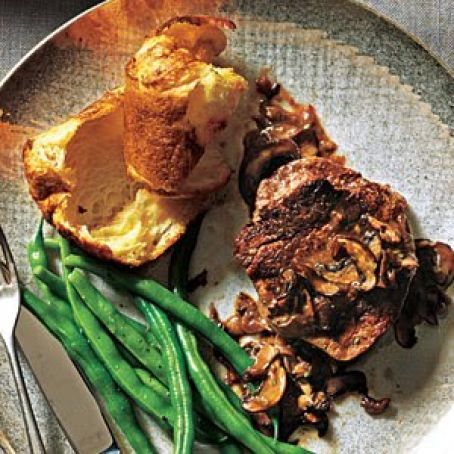 Beef Filets with Mushroom Sauce and parmesan popovers