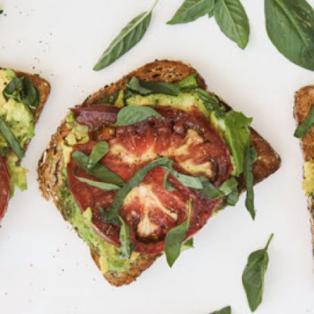 Garlic Avocado Toast w/heirloom tomato and basil