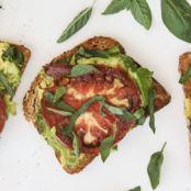 Garlic Avocado Toast w/heirloom tomato and basil