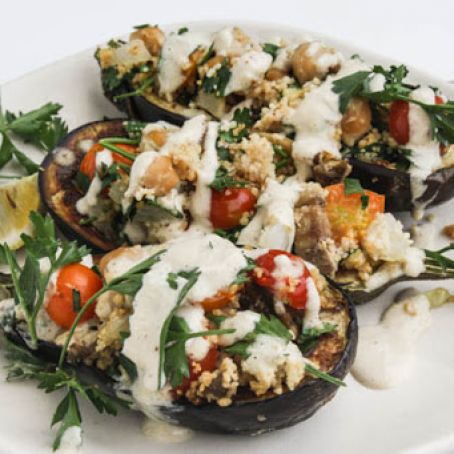 Chickpea Stuffed Eggplant with Couscous and Tahini Sauce
