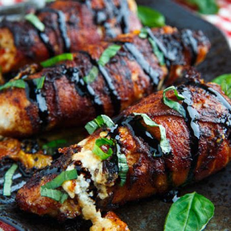Bacon Wrapped Roasted Red Pepper and Goat Cheese Stuffed Chicken with Balsamic Drizzle and Basil