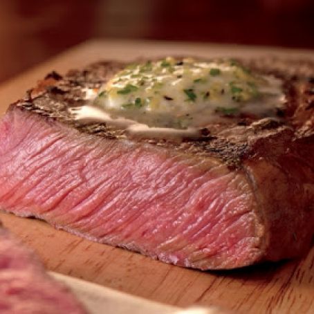 Rosemary Marinated Ribeye Steaks with Lemon Pepper Butter