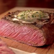 Rosemary Marinated Ribeye Steaks with Lemon Pepper Butter