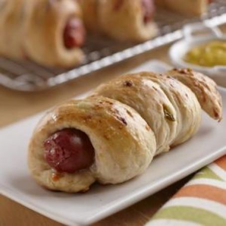 Bacon and Cheddar Cheese Pretzel Wrapped Dogs
