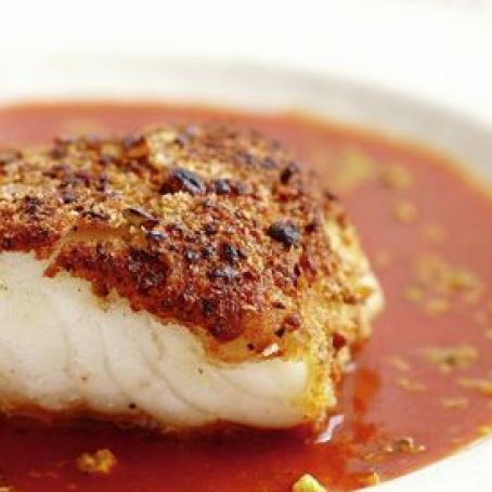 Pistachio-Crusted Sea Bass with Tomato Curry Broth