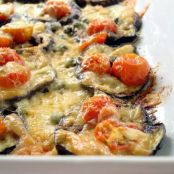 Grilled eggplant with tomatoes and cheese