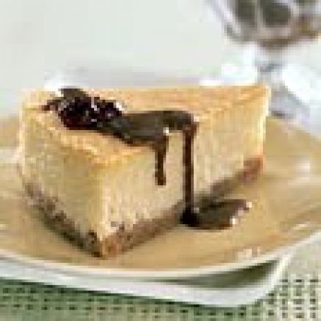 Mascarpone Cheesecake with Candied Pecans and Dulce de Leche Sauce