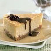 Mascarpone Cheesecake with Candied Pecans and Dulce de Leche Sauce