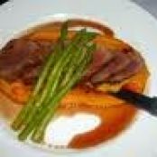 Garlic and Rosemary Pork Tenderloin with an Orange Juice Reduction, Sweet Potato Puree and Steamed A