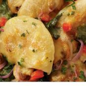 Cheddar-crusted perogies and veggies