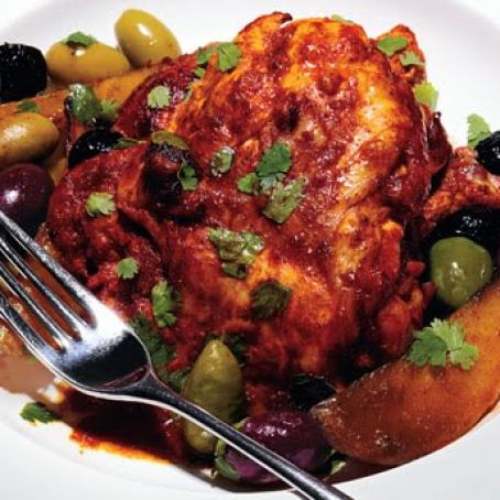 Roasted Chili-Citrus Chicken thighs with mixed Olives and potatoes