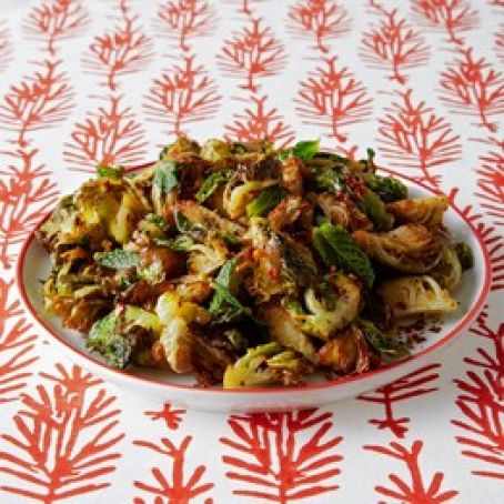 Fried Brussels Sprouts with Savory Onion Caramel, Garlic Confit, Lime, Mint & Aleppo Pepper