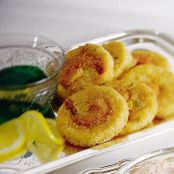 Grit cakes with shrimp and jalapeno sauce