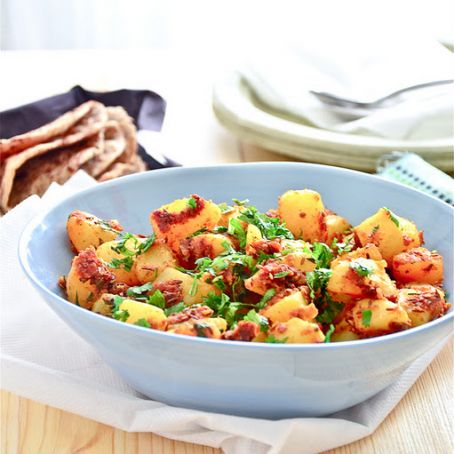 Potatoes cooked with cumin