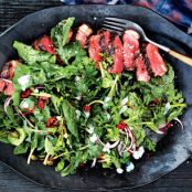 Sliced Strip Steak with Arugula and Parsley