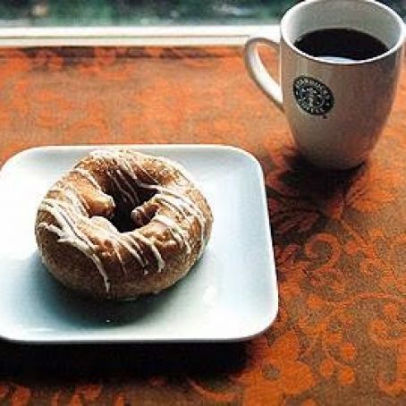 Pumpkin Doughnuts with Powdered Sugar Glaze