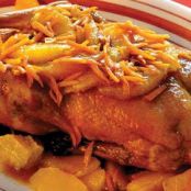Pato asado con naranjas