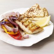 HALIBUT, PEPPERS AND ONION WITH LEMON AND OREGANO