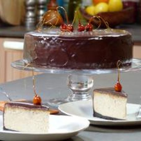 Chocolate Glazed Praline Cheesecake with Candied Hazelnuts