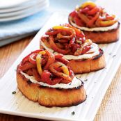 Grilled Goat Cheese Crostini with a Tangle of Marinated Roasted Peppers