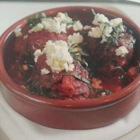 Lamb Meatballs with spiced tomato sauce, mint, and feta